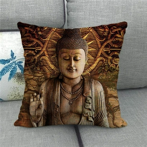 Macro shot of Buddha face relief print on linen cushion cover with intricate patterns