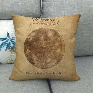 Detailed macro view of linen texture on Mercury planet pillow cover on a grey sofa