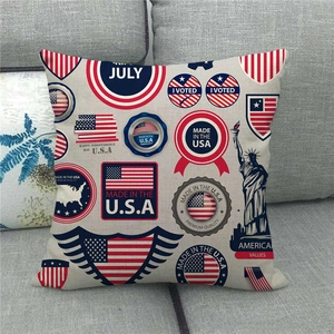 Close-up of linen pillow cover with US flag design and Statue of Liberty silhouette