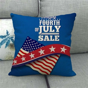 Detailed texture of Fourth of July linen pillow cover with US flag design on a sofa