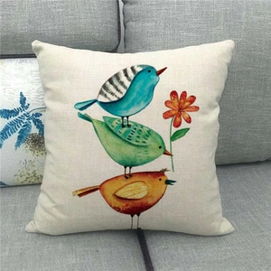 Detail of linen texture and minimalist bird print on square decorative pillowcase