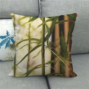 Detailed close-up of ink wash bamboo forest print on textured linen throw pillow cover