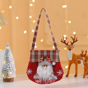 Christmas non-woven gift bag with 3D Santa Claus and festive red green plaid pattern