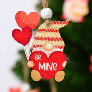 Detail of wooden gnome ornament with red heart and Be Mine text for Valentine's Day decor