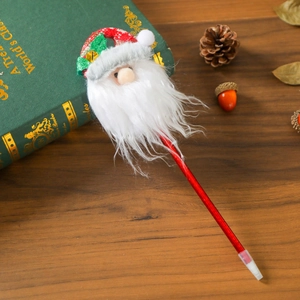 Nahaufnahme des roten Weihnachts-Kugelschreibers mit Plüsch-Weihnachtsmann und Glocke