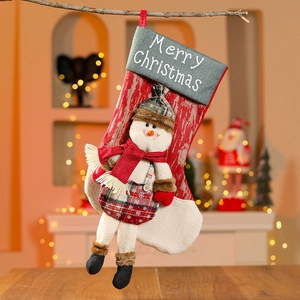 Hanging Christmas stocking featuring 3D snowman and Merry Christmas embroidery