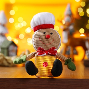 Light-up Christmas gingerbread man chef plush figurine with warm LED glow and holiday decor