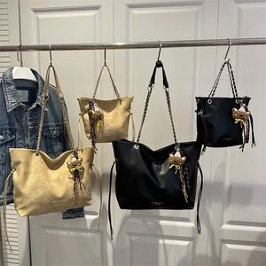 Minimalist faux suede and leather tote bags with chain straps and teddy bear pendants