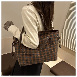 Classic tartan plaid tote bag with premium brown leather straps and drawstring details