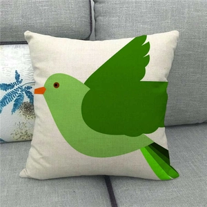 Gros plan du motif d'oiseau sur la taie d'oreiller en lin avec texture de tissu