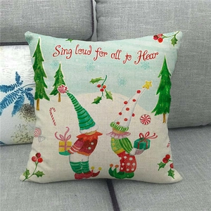Detail of linen Christmas pillowcase with gnomes and Sing Loud for all to Hear text