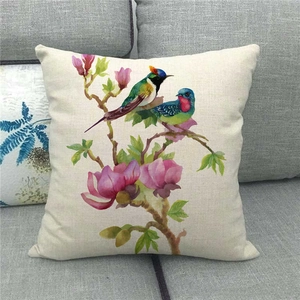 Detail of floral and bird watercolor pattern on linen square throw pillow cover