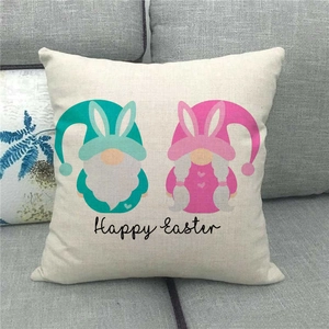 Close-up of Happy Easter linen pillowcase featuring cute festive gnomes on a sofa