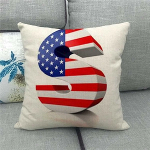 Close-up of square linen pillowcase featuring a 3D letter S with US flag pattern