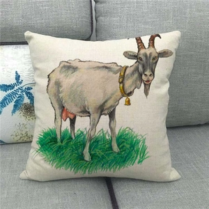 Detailed texture of linen pillowcase featuring a goat with a bell on a grey sofa