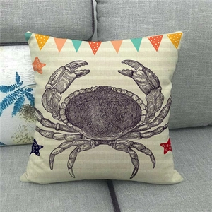 Detailed texture of watercolor crab and sea stars printed on a linen throw pillow cover