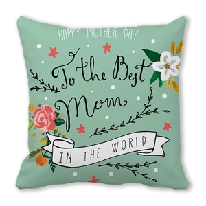 Detail of Happy Mother’s Day pillow cover with floral patterns on mint green fabric