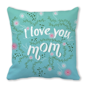 Detail view of I love you mom peach skin pillowcase with teal fabric and floral design