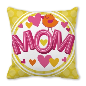Close-up of peach skin pillowcase with MOM text, colorful hearts and bird illustration