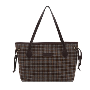 Plaid canvas bucket tote bag with leather handles and drawstring side details