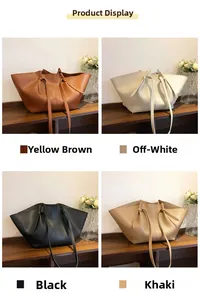 Detail view of large leather tote bags in four colors: brown, off-white, black and khaki
