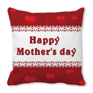 Detail of red Happy Mother's Day pillowcase with white lace border and heart patterns