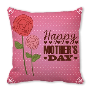 Close-up of pink polka dot pillowcase with Happy Mother's Day text and rose flowers
