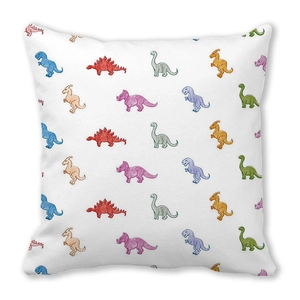Detail view of cartoon dinosaur prints on peach skin fabric square pillowcase