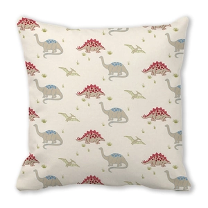 Detail of fabric texture with cute red, blue, and green cartoon dinosaur patterns