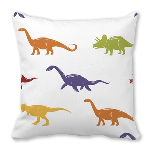 Close-up of peach skin throw pillow case with colorful cartoon dinosaur illustrations