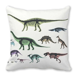 Close-up of a square peach skin pillowcase with colorful dinosaur skeleton and fossil prints