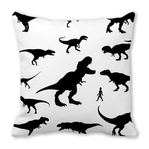 Close-up of black dinosaur silhouettes printed on white peach skin fabric pillowcase
