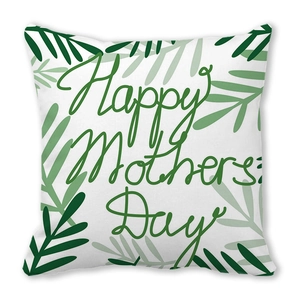 Dettaglio della federa Happy Mothers Day con motivi di foglie di palma verdi su bianco