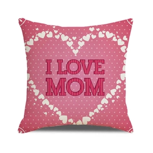 Close-up of pink linen pillowcase with white dots and I LOVE MOM heart design