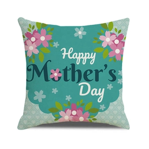 Detail of linen cushion cover featuring floral patterns and Happy Mother's Day text