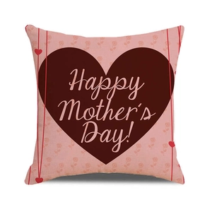 Close-up of Mother's Day linen pillow cover with pink rose pattern and heart design