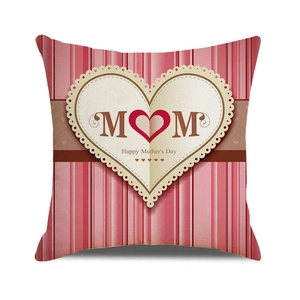 Close-up of linen pillowcase with pink stripes and Happy Mother's Day heart design
