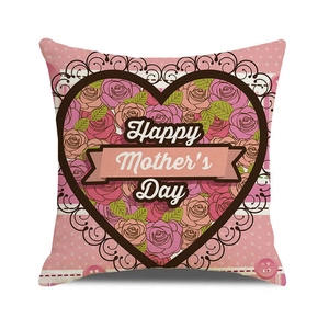 Close-up of linen pillow cover with floral heart design and Happy Mother's Day text