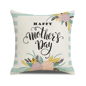 Detail of linen cushion cover with floral print and Happy Mother's Day text design