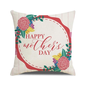 Dettaglio della federa in lino con ghirlanda floreale e testo Happy Mother's Day inciso