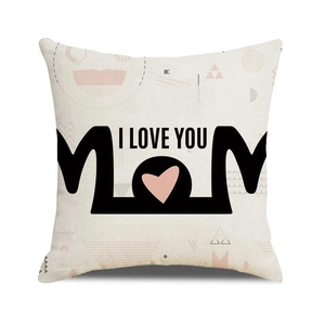 Close-up of linen pillowcase with black MOM text and pink heart for Mother's Day
