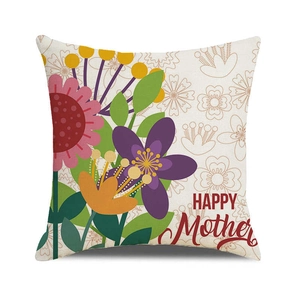 Detail of linen cushion cover showing colorful floral prints and Happy Mother text