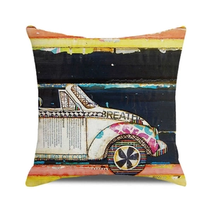Detail of square pillowcase featuring vintage car collage art and breathe typography