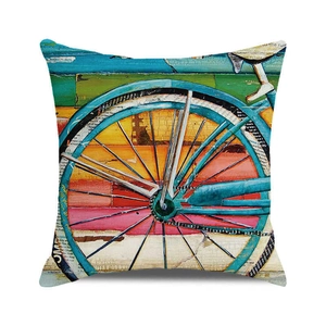 Artistic collage of vintage bicycle wheel on a colorful square decorative pillow cover