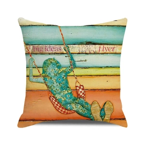 Detail of square cushion cover featuring a child silhouette with blue floral pattern print