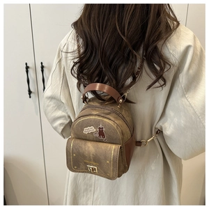 Mini brown retro backpack with cute cat patch, chain strap and gold logo detail