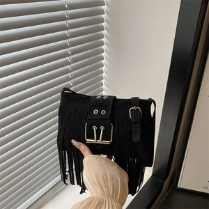 Retro black suede bucket bag with tassel fringes and metal buckle detail for women