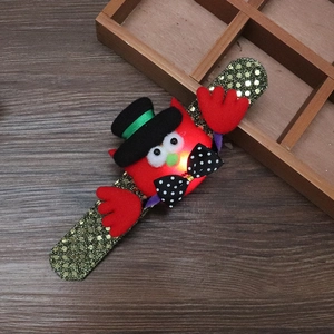 Glow-in-the-dark Halloween slap bracelet featuring red cartoon owl with gold sequins