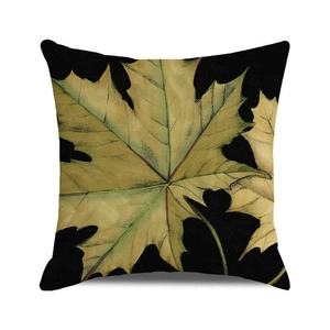 Texture détaillée du motif de feuilles d'érable d'automne sur une housse de coussin