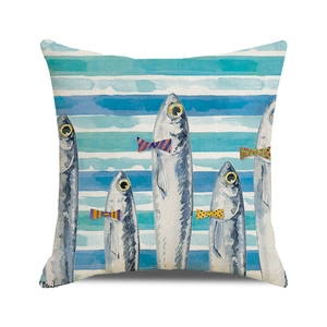 Detailed view of linen cushion cover featuring watercolor fish and blue stripes